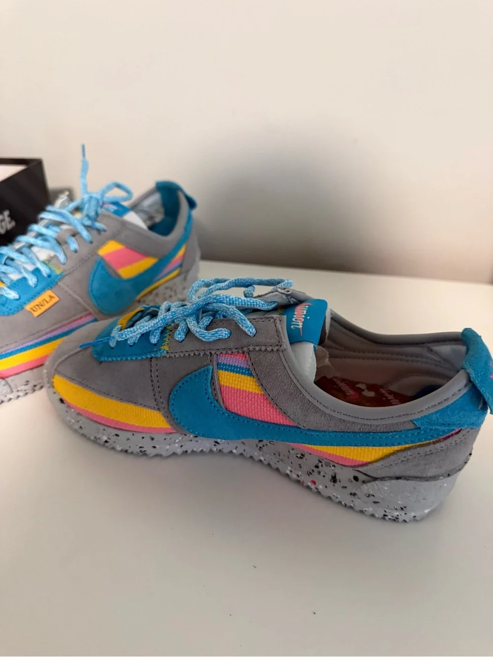 Nike Women's Gray Sneakers with Blue, Pink & Yellow Accents